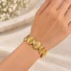 gold_shell_bracelet_worn_TRUE_PNG Gold Plated Scallop Shell Openable Cuff Bracelet