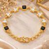 Gold Plated Black & White Stone Bracelet